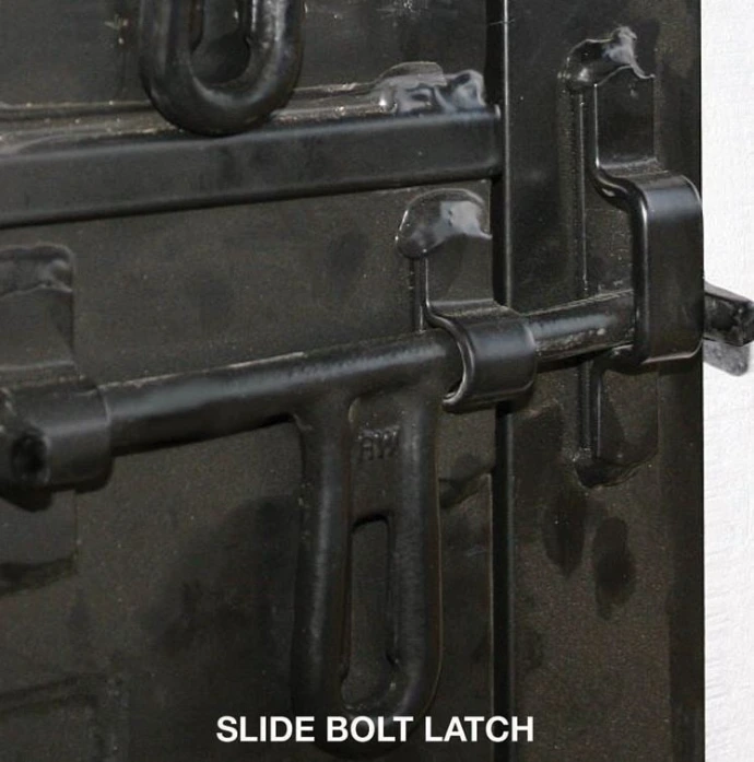 SLIDE BOLT LATCH: Black metal slide bolt latch mechanism mounted on dark metal stall door frame