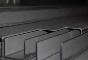 Metal railing in its raw form, ready to be made into horse stalls