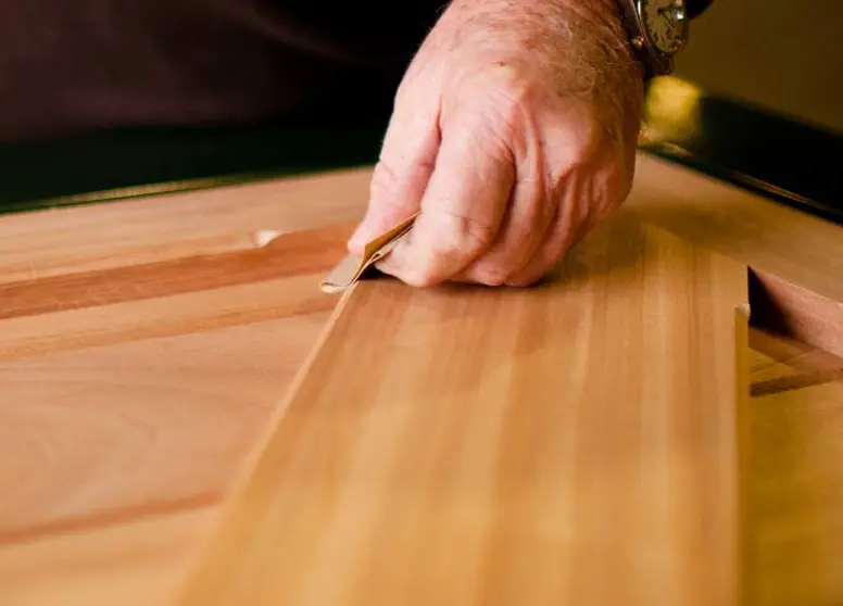 Wood being finished in preparation for horse stalls