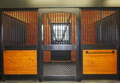 Horizontal Wood Fill: Golden orange-trimmed stall front with horizontal pine lumber lower panels and black wire mesh center panel