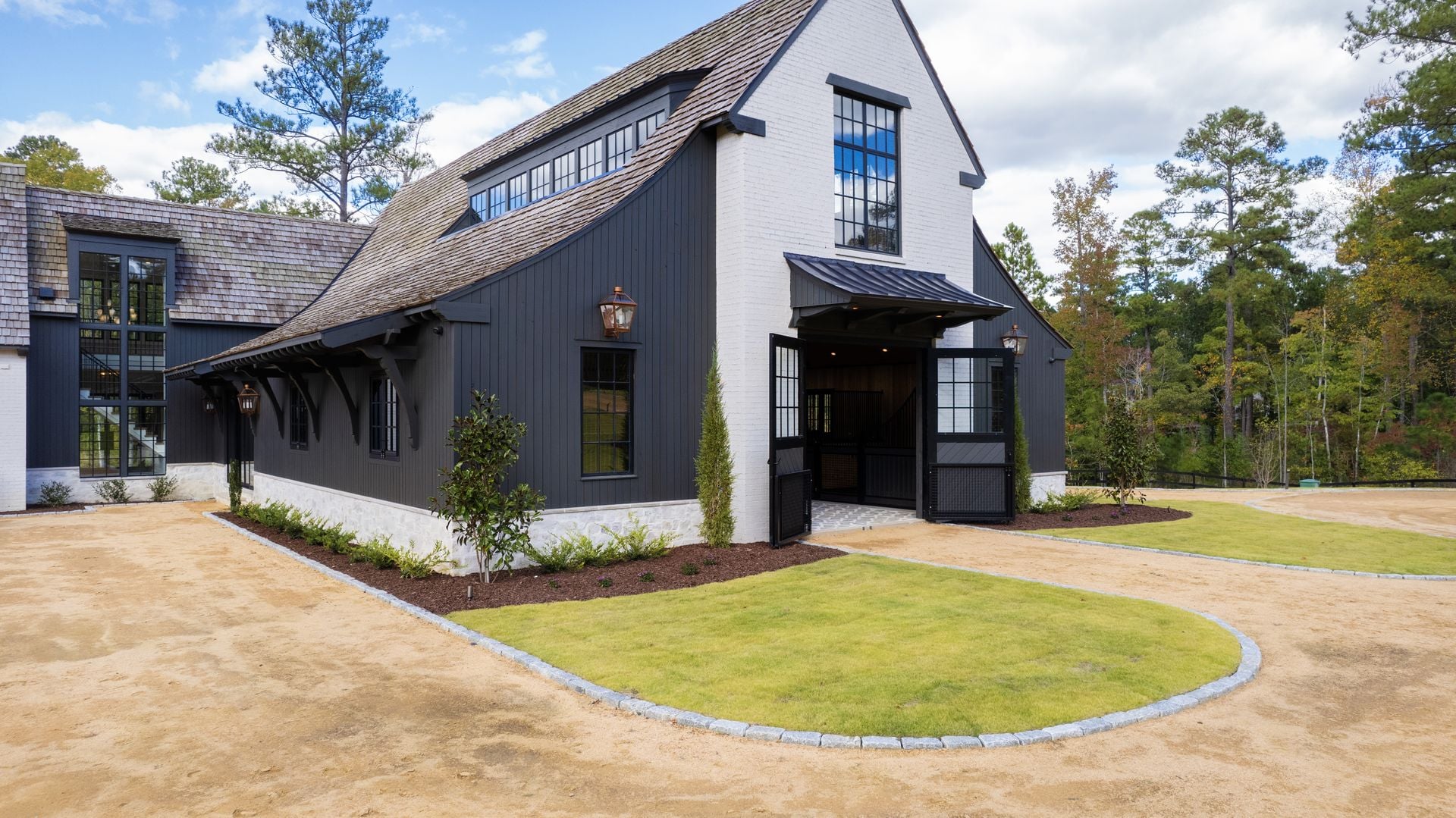 Aisle Entry Doors by Lucas Equine Equipment with Dog Gates